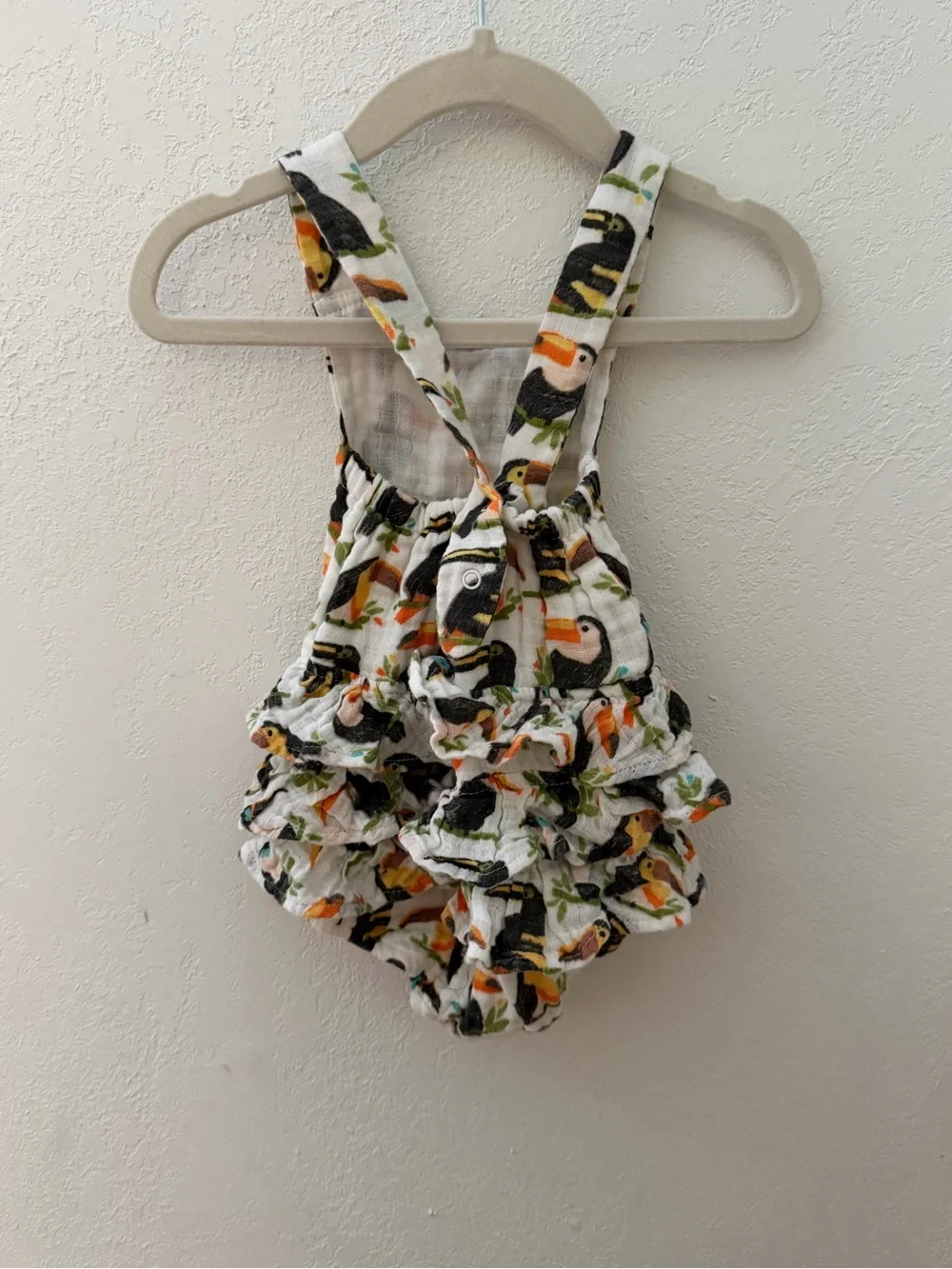 Baby Toucan Print Ruffled Romper - White, Black, Yellow